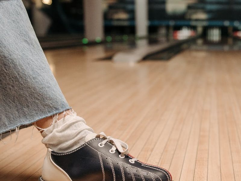 Detailed shot of athletic shoes on a wooden floor